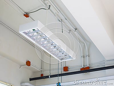 Fluorescent lamp installed on ceiling Stock Photo