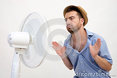 Flushed man feeling hot Stock Photo