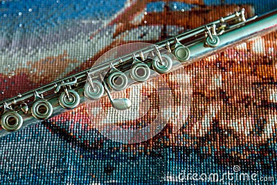 Flute on bright colored background of beads Stock Photo