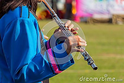 Flute music instrument hands close up Orchestra player flutist w Stock Photo