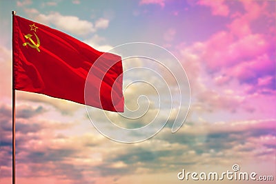 Fluttering Soviet Union (SSSR, USSR) flag mockup with the space for your content on colorful cloudy sky background Stock Photo