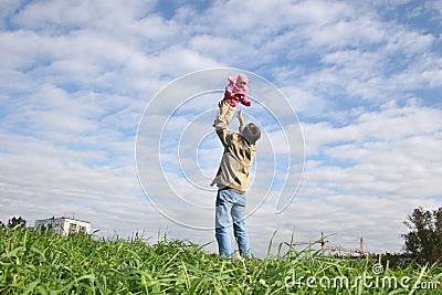 Fly baby and father Stock Photo