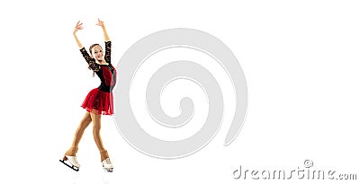 Flyer. Portrait of little flexible girl, figure skater wearing stage attire posing isolated on white studio background Stock Photo