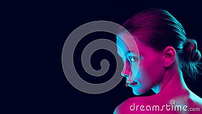 Flyer with young beautiful girl with well-kept skin and without makeup isolated over dark background in neon light Stock Photo