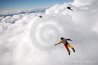 Flying above cumulus clouds Stock Photo