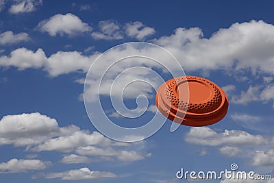 Flying clay pigeon target in the blue sky background , shotgun shooting game Stock Photo