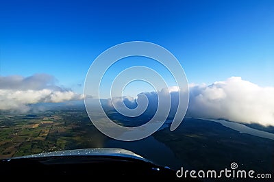 Flying With The Clouds Stock Photo