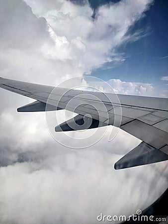 Flying Dreams: Cloudscapes Unveiled from the Aircraft Window Stock Photo