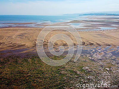 Flying a drone during a beach detonation Stock Photo