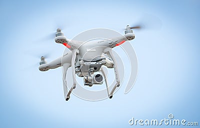 Flying drone with camera Stock Photo