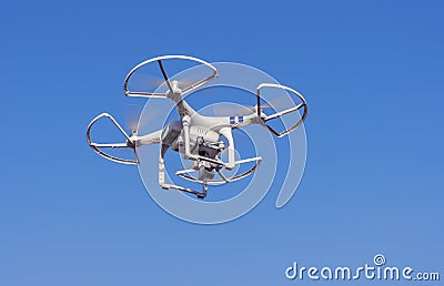 Flying drone with camera Stock Photo