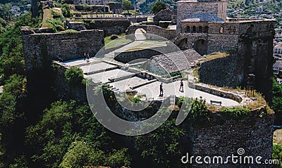Flying drone over Gjirokaster Castle, at the historical UNESCO protected town of Gjirokaster, Albania. Editorial Stock Photo