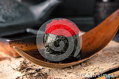 Flying fish roe Tobiko gunkan. Sushi menu. Stock Photo