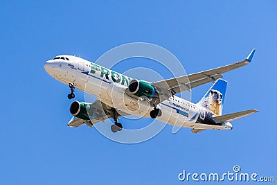 Flying Frontier Airlines aircraft Editorial Stock Photo