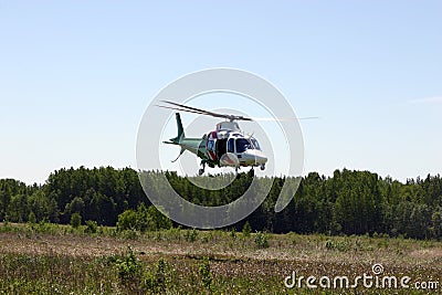 Flying helicopter. Stock Photo