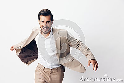 suit man business winner young victory beige happy hand businessman running Stock Photo