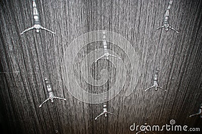 Flying men at the waterfall in the Dubai Mall Editorial Stock Photo