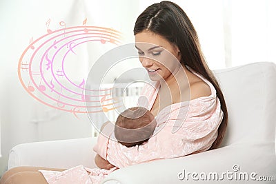 Flying music notes and woman breastfeeding her baby in nursery. Lullaby songs Stock Photo