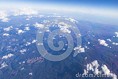 Flying over Croatia, mountain landscape covered with few clouds Stock Photo