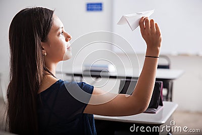 Flying paper planes in detention Stock Photo