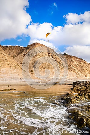 Flying paraglider Stock Photo