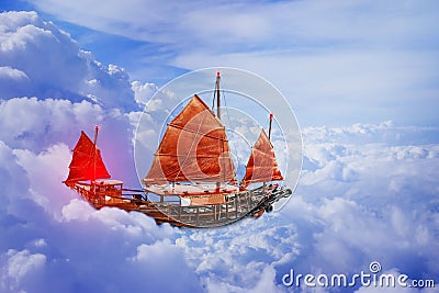 Flying classic sailboat Stock Photo