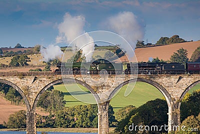 The Flying Scotsman crossing St Germans viaduct, Cornwall Editorial Stock Photo