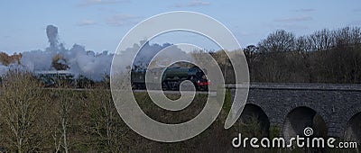 Flying Scotsman and train at Corfe Castle Editorial Stock Photo