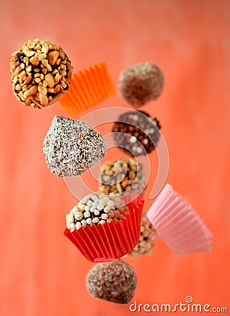 Flying sweets with different sprinkles Stock Photo