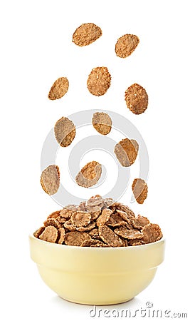 Flying to the bowl cereal flakes isolated on a white background Stock Photo