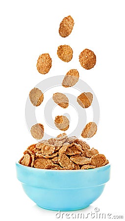 Flying to the bowl cereal flakes isolated on a white background Stock Photo