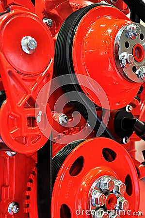 Flywheel and belt on vehicle engine Stock Photo