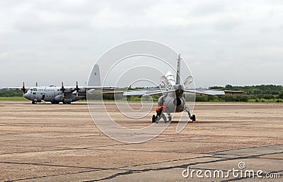 FMA IA-63 Pampa and Lockheed C-130 Hercules at I Air Brigade of El Palomar in Buens Aires Argentina Editorial Stock Photo