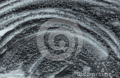 Foam blue texture soap bubbles on the water abstract background. Cream texture Stock Photo