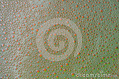 The foam bubbles on the red and green texture background Stock Photo