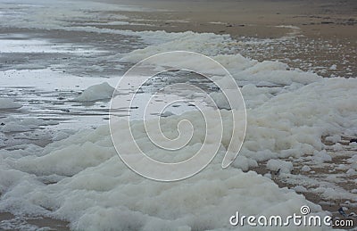 Foam created by the agitation of seawater Stock Photo