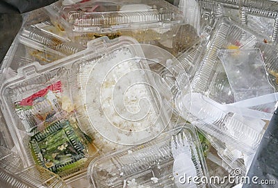 Foam and plastic food container in the bin Stock Photo