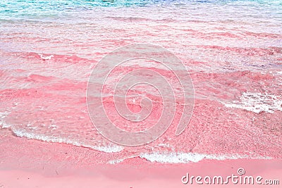 Foamy Rippled Clear Sea Wave Rolling to Pink Sand Shore Turquoise Blue Water. Beautiful Tranquil Idyllic Scenery Stock Photo