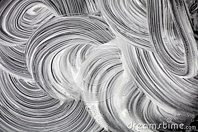 Foamy wave stains on black surface. Abstract texture grunge. background Stock Photo