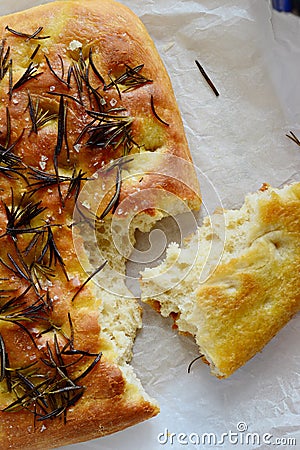 Focaccia bread decorated with salt and rosemary Stock Photo