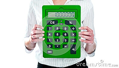 Focus on green calculator. Woman holding Stock Photo