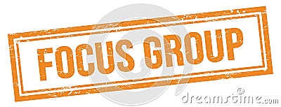 FOCUS GROUP text on orange grungy vintage stamp Stock Photo