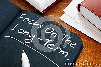 Focus on the long term written on the page Stock Photo