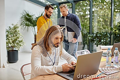 focused attractive businessmen in casual outfit Stock Photo