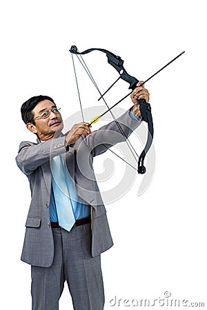 Focused businessman shooting a bow and arrow Stock Photo