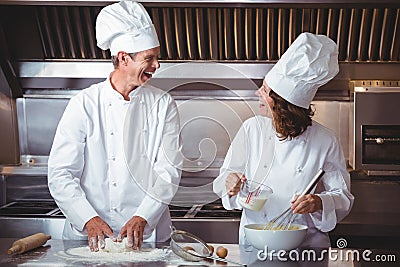 Focused chef preparing a cake Stock Photo