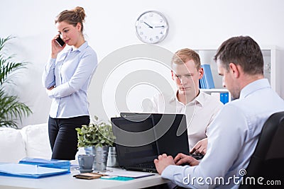 Focusing on the work Stock Photo