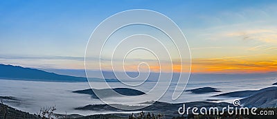 Fog and cloud mountain valley at sunset Editorial Stock Photo