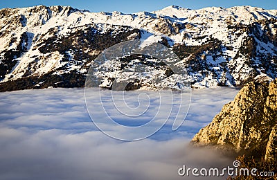 Fog and cloud snow mountain valley landscape. View of Aramo Mountain, Asturias, Spain Stock Photo