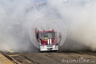 A fire goes through a heavy fire from a fire. Stock Photo